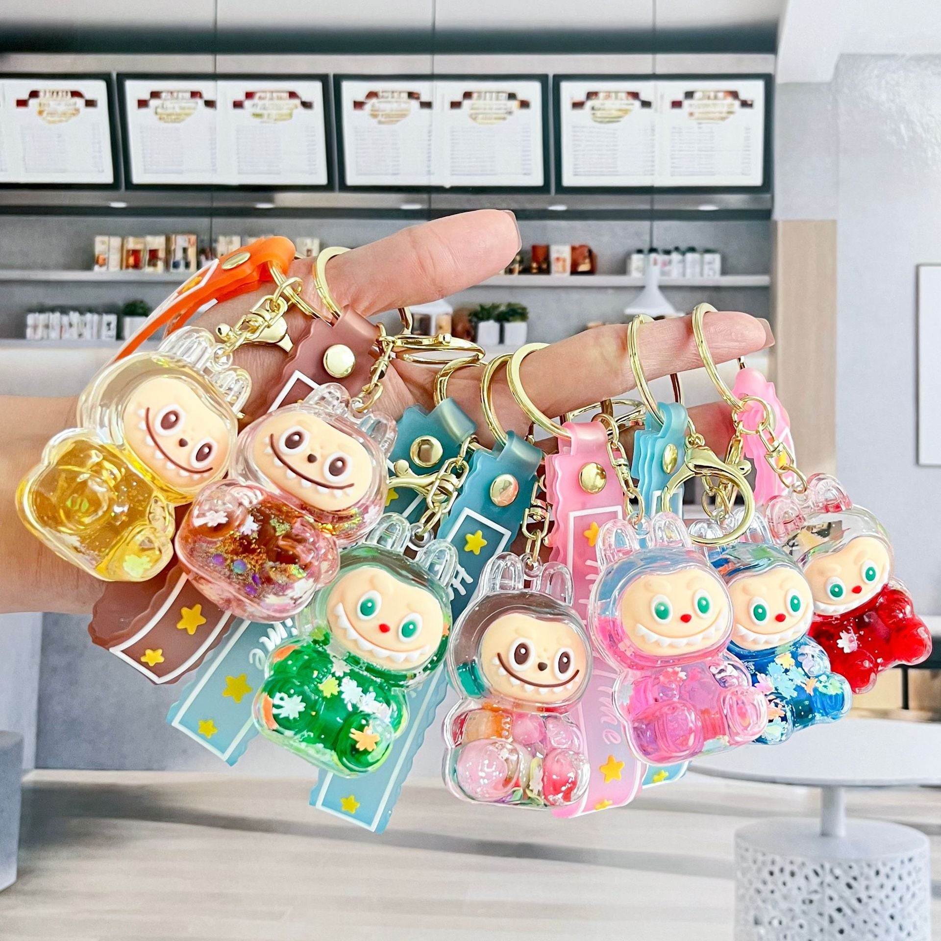 Liquid Doll Key Ring with Strap – Monster Face Design