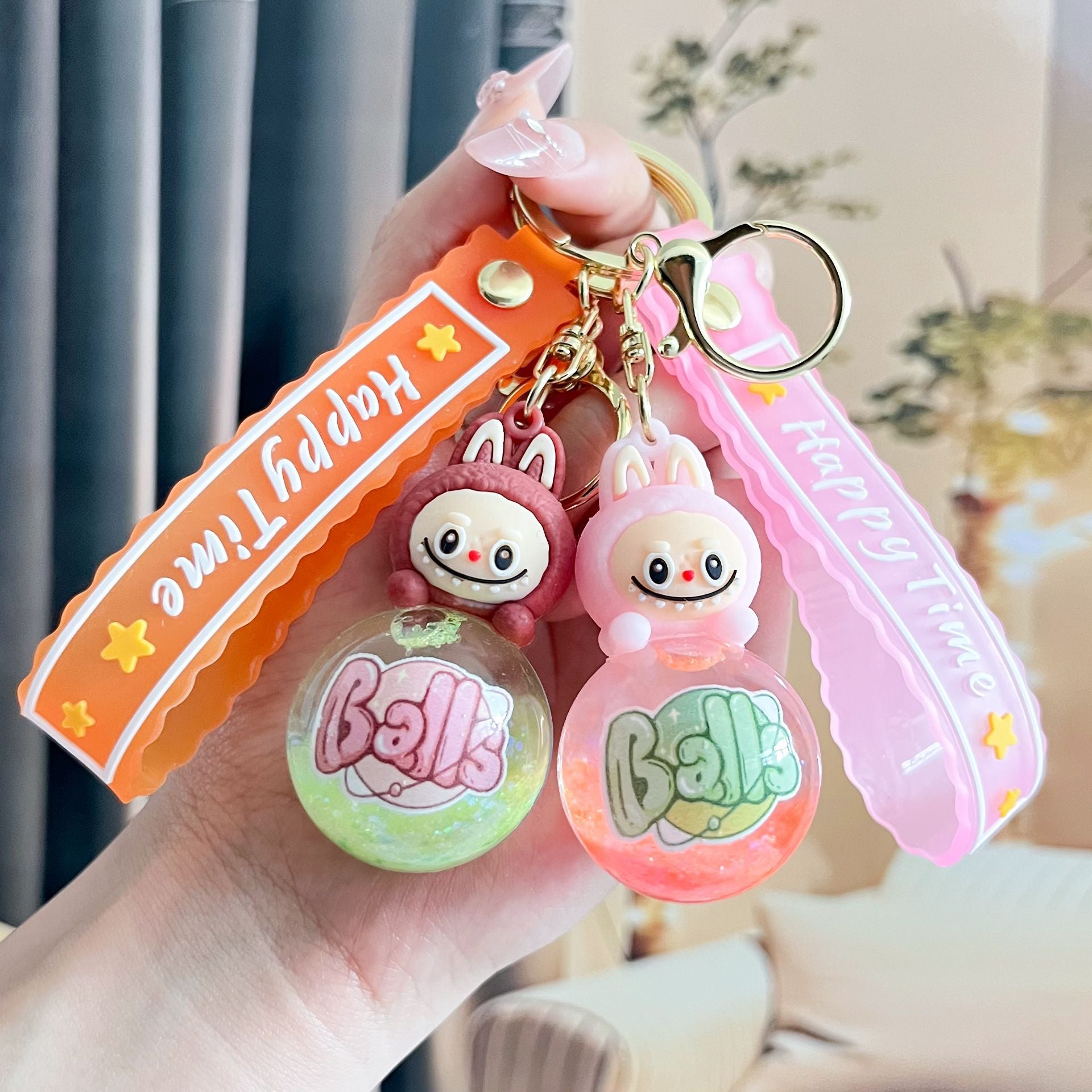 Liquid Doll Key Ring with Strap – Monster Face Design