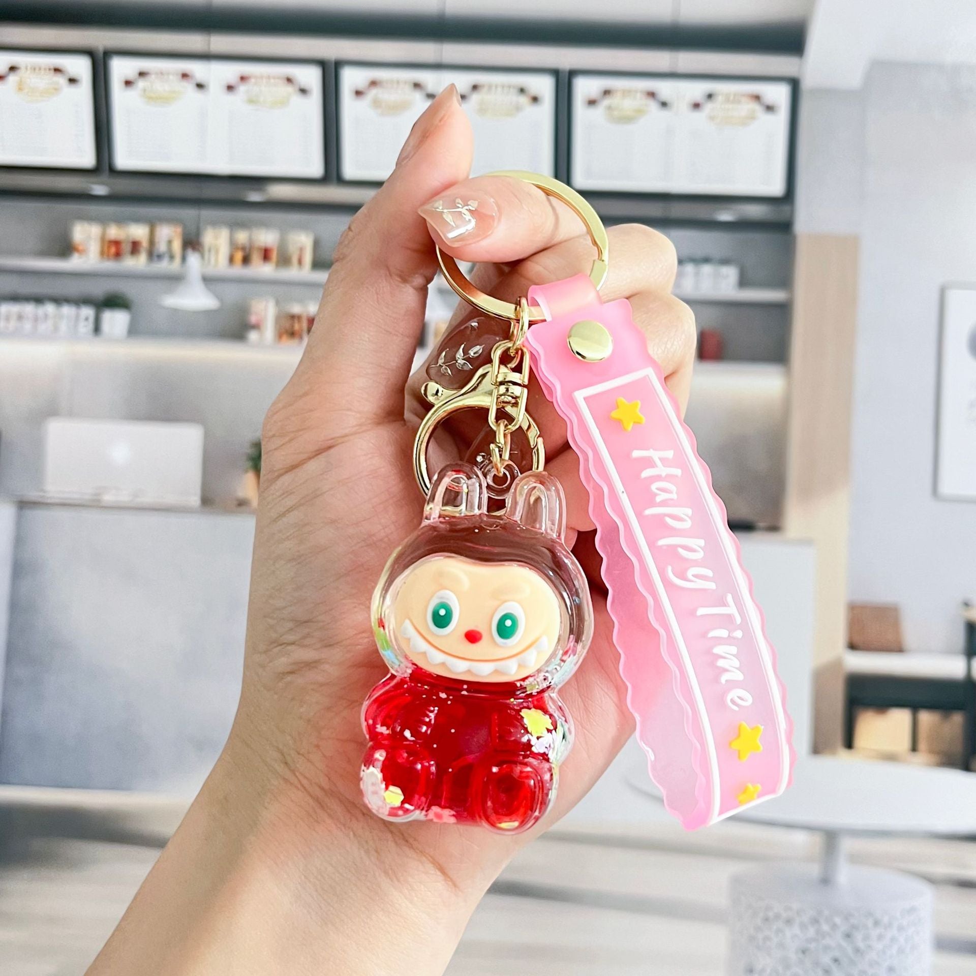 Liquid Doll Key Ring with Strap – Monster Face Design