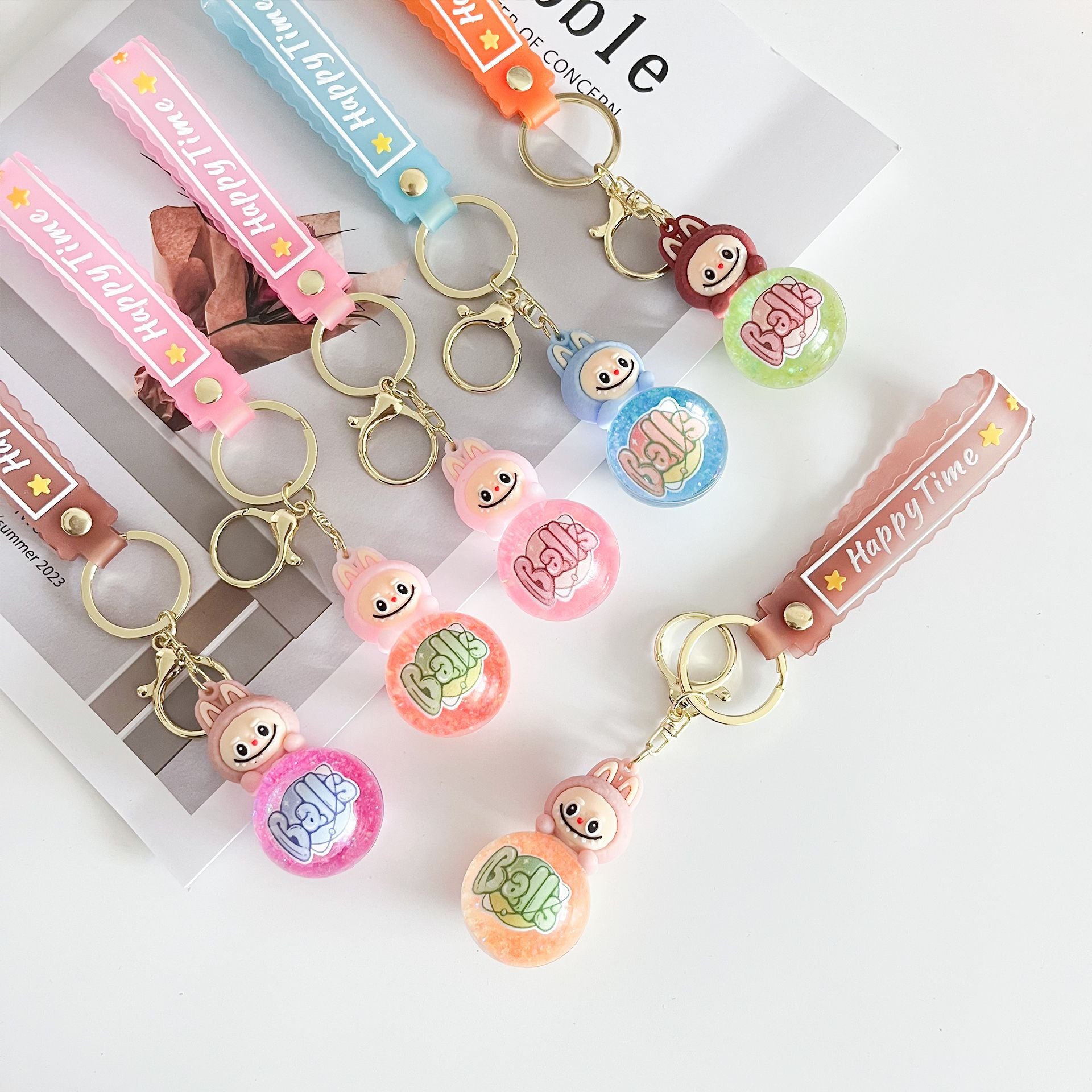 Liquid Doll Key Ring with Strap – Monster Face Design