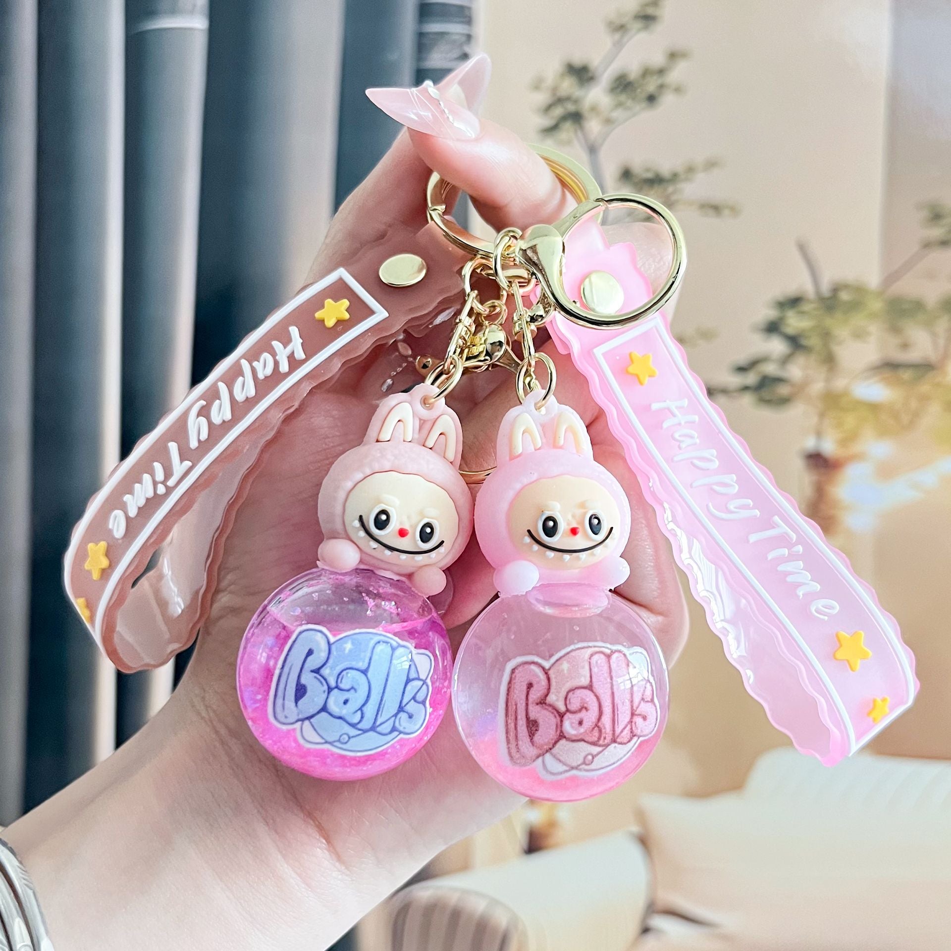 Liquid Doll Key Ring with Strap – Monster Face Design
