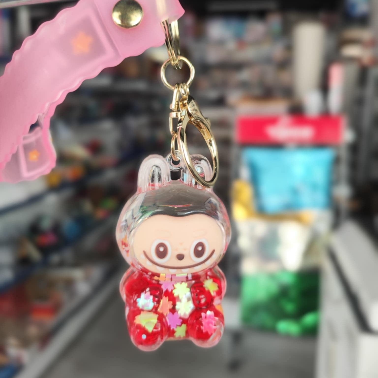 Liquid Doll Key Ring with Strap – Monster Face Design