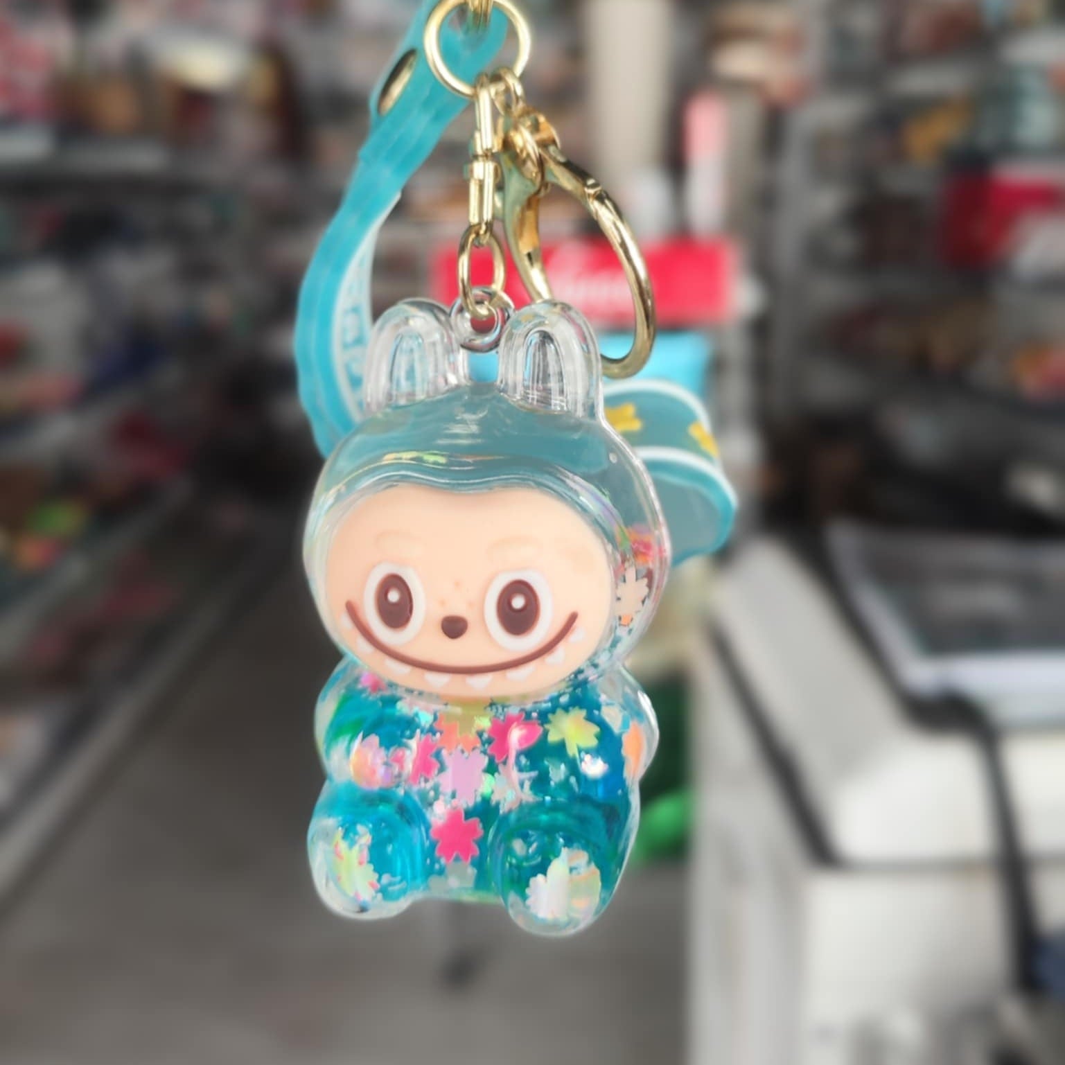 Liquid Doll Key Ring with Strap – Monster Face Design