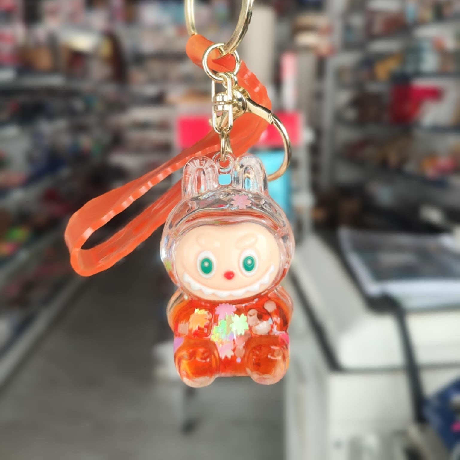 Liquid Doll Key Ring with Strap – Monster Face Design