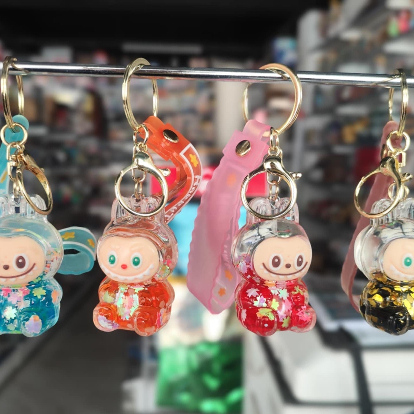 Liquid Doll Key Ring with Strap – Monster Face Design