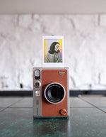 كاميرا Instax Mini EVO للأفلام الفورية من Fujifilm | بني