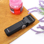 Olsenmark Rechargeable Hair Trimmer with Adjustable Comb