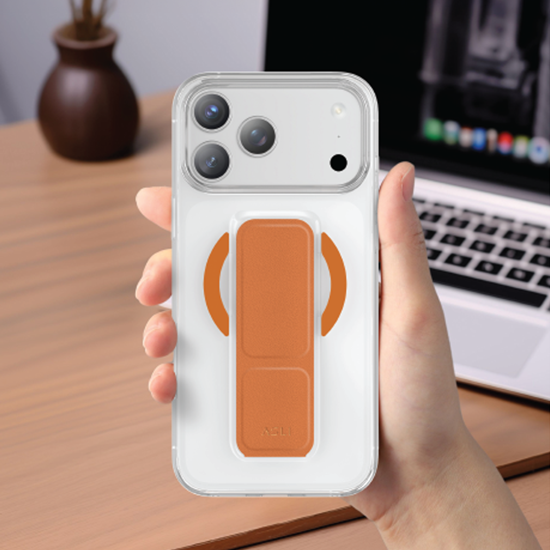 كڤر حماية شفاف MagTrox Gravitas من أسلي جلوبال يدعم MagSafe مع مسكة جلد أنيقة لهاتف iPhone 17 Pro | برتقالي تيتانيوم